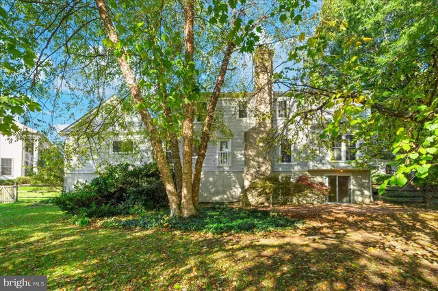 a backyard of a building with trees