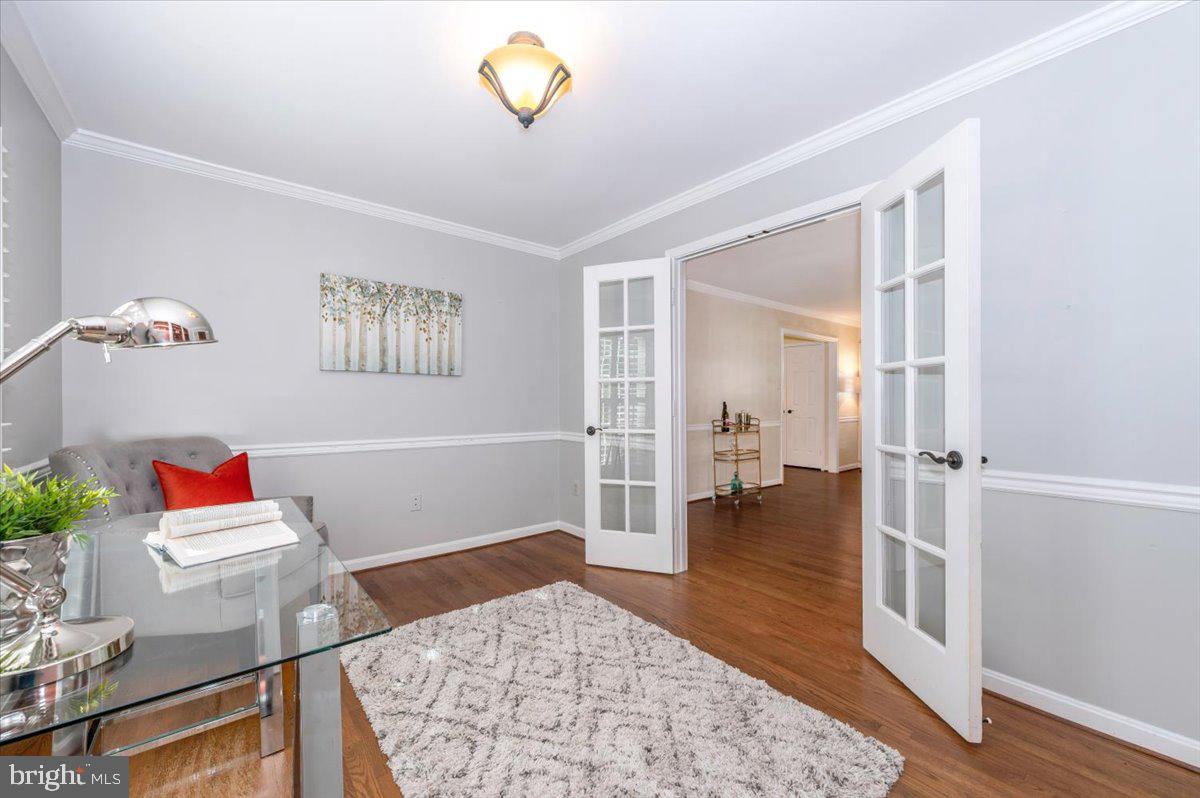 10 Megans Court Olney, MD 20832 - Photo 5 of 47 a bedroom with furniture and a rug