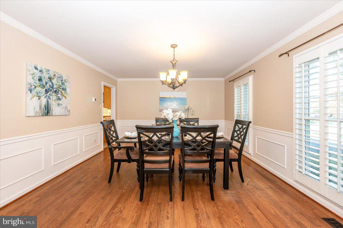 10 Megans Court Olney, MD 20832 - Photo 9 of 47 a view of a dining room with furniture window and wooden floor