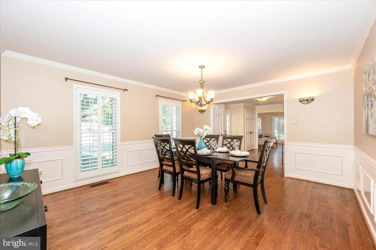 10 Megans Court Olney, MD 20832 - Photo 10 of 47 a view of a dining room with furniture window and wooden floor