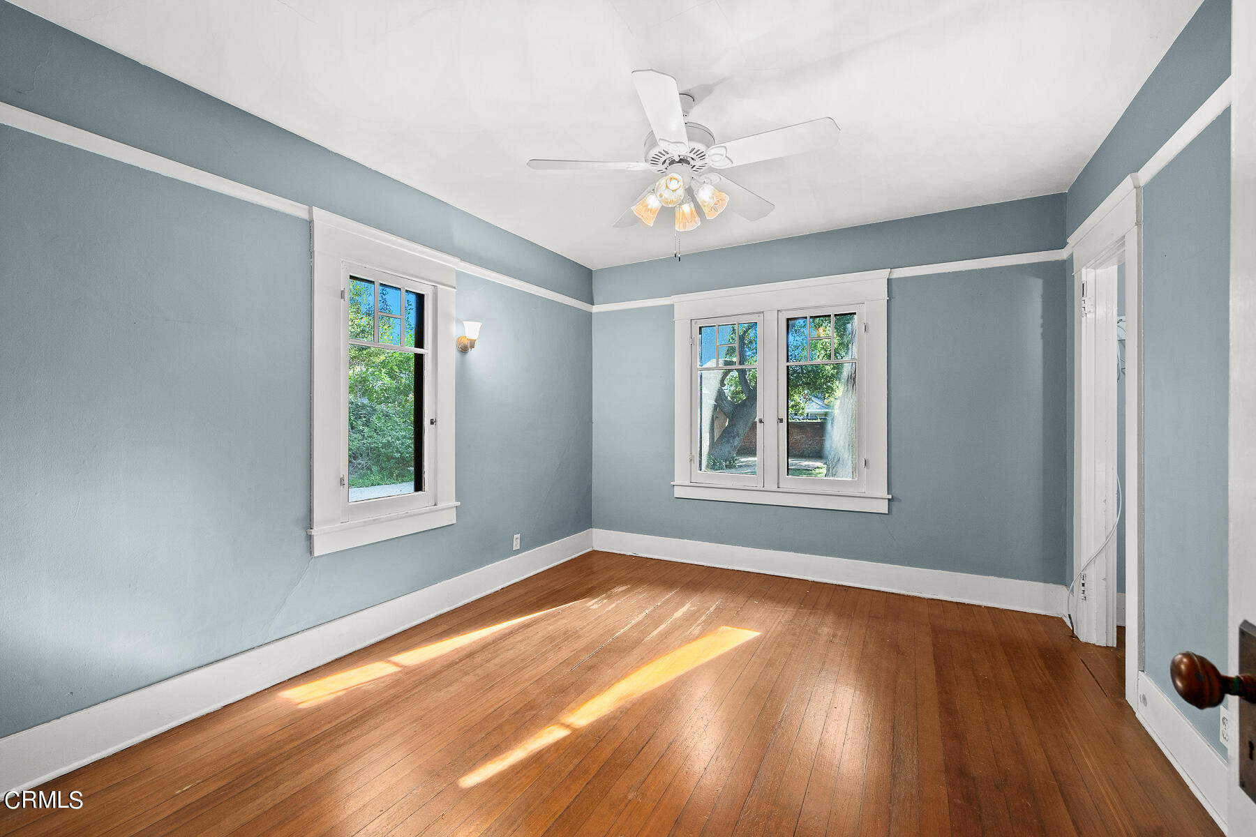 310 Congress Place Pasadena, CA 91105 - Photo 11 of 23 a view of an empty room with wooden floor and a window