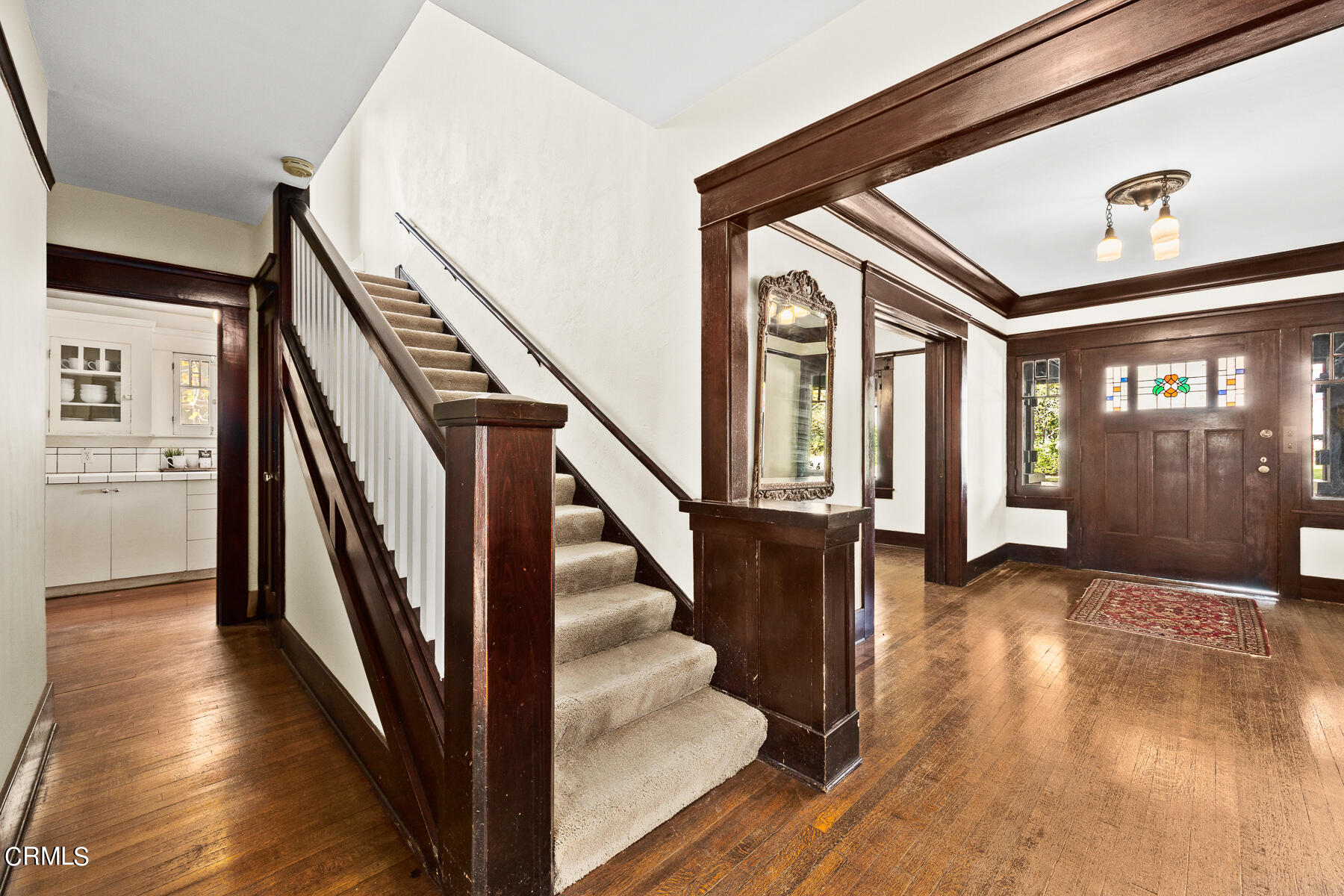 310 Congress Place Pasadena, CA 91105 - Photo 13 of 23 a view of an entryway with wooden floor and staircase