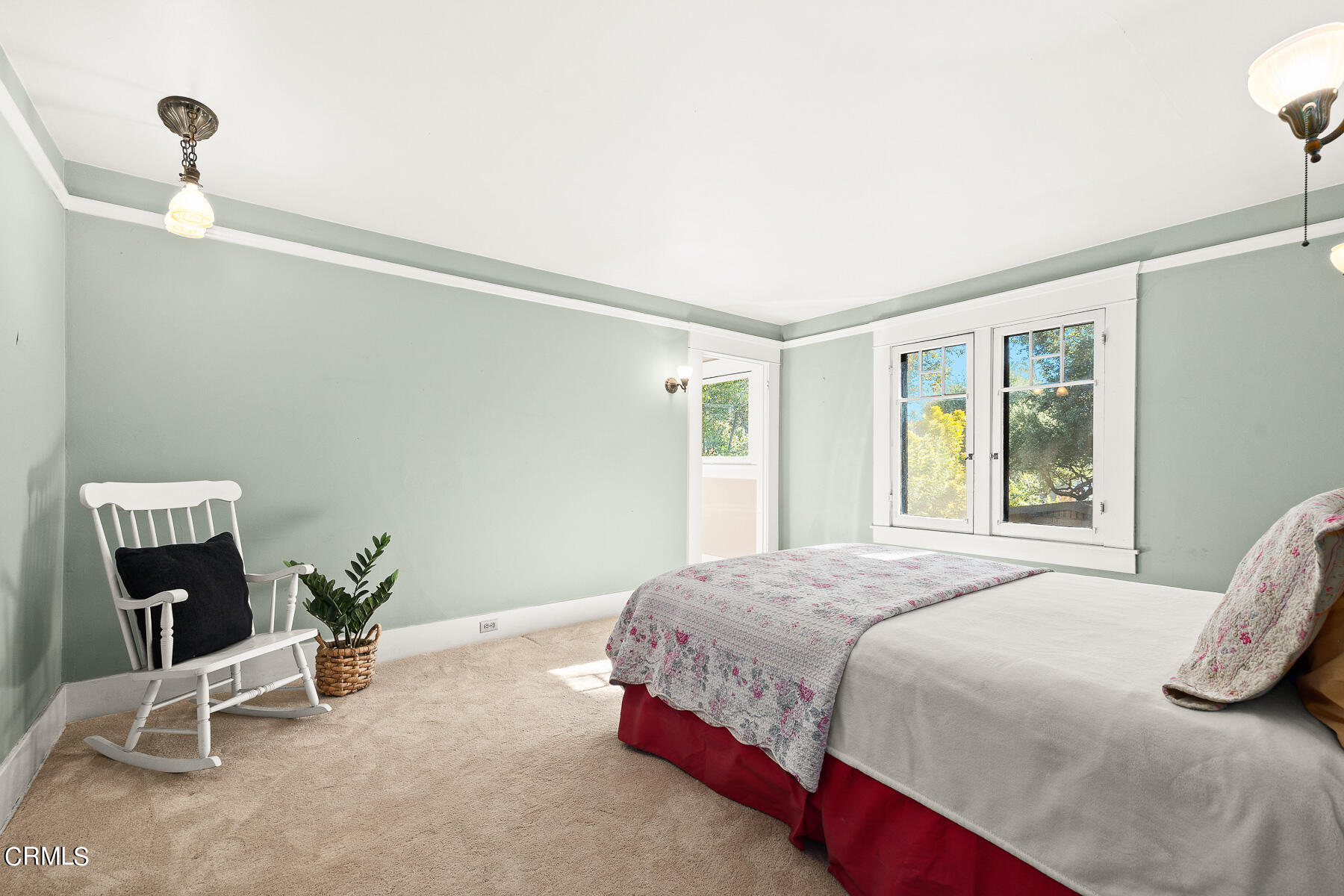 310 Congress Place Pasadena, CA 91105 - Photo 17 of 23 a bedroom with a bed a chair and potted plant on the dresser