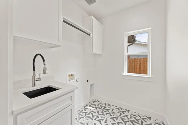 a view of a backyard with small cabin