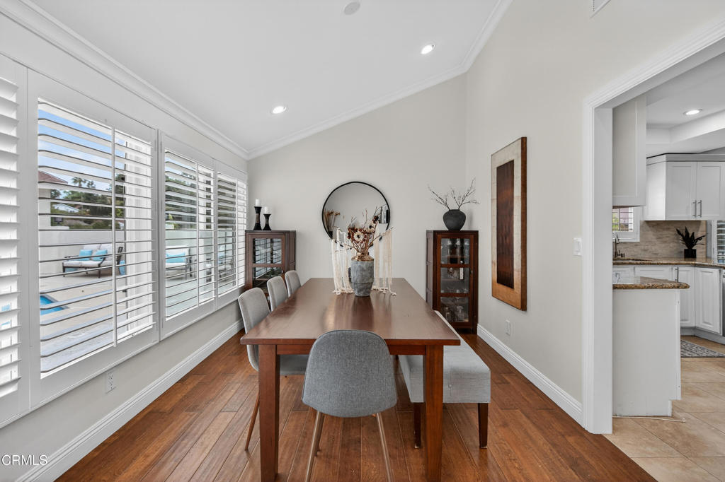 9325 La Shell Drive Tujunga, CA 91042 - Photo 11 of 46 a view of a dining room with furniture window and wooden floor