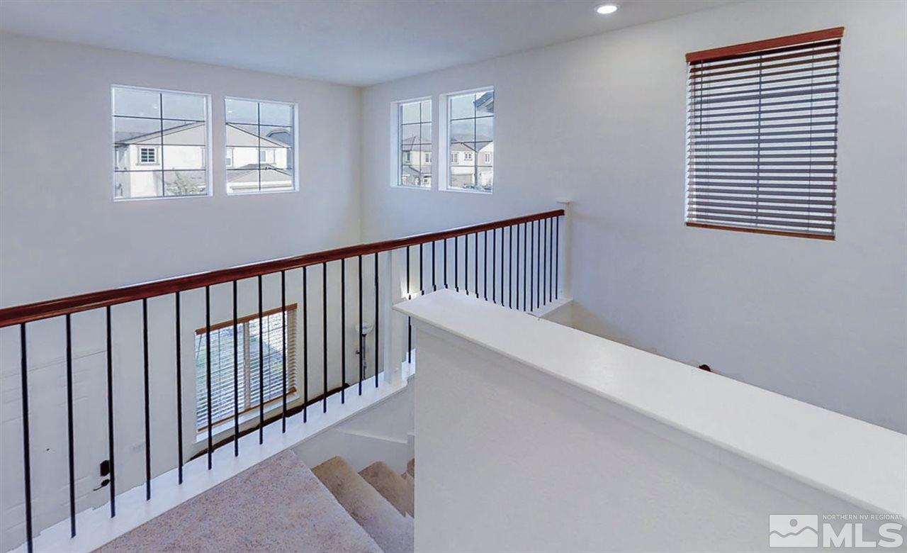 9715 Pachuca Drive Reno, NV 89521 - Photo 5 of 10 a view of entryway and hall with wooden floor