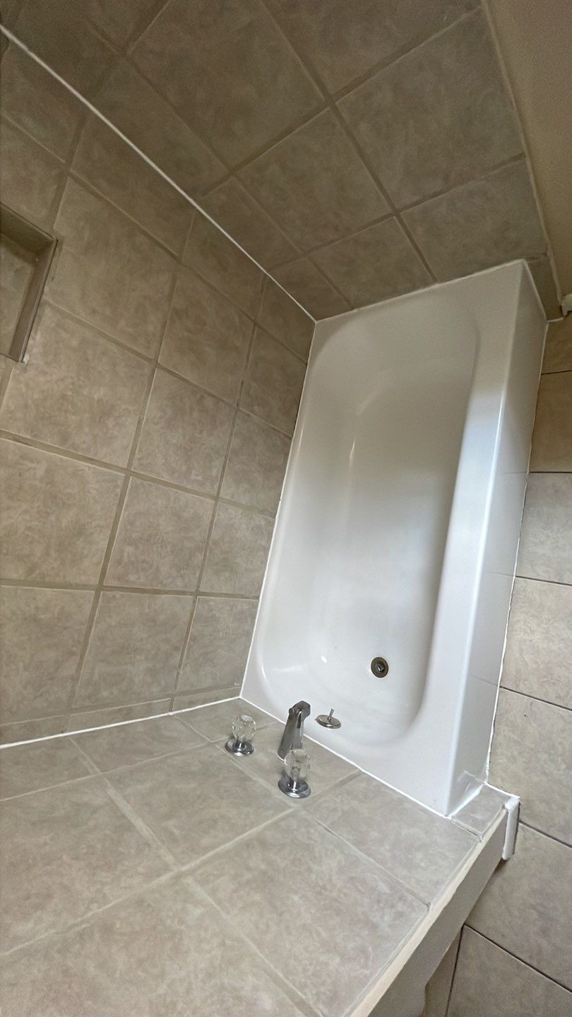 1305 Adams Street, Unit 4 Conroe, TX 77301 - Photo 15 of 32 a bathroom with a granite countertop shower and a sink