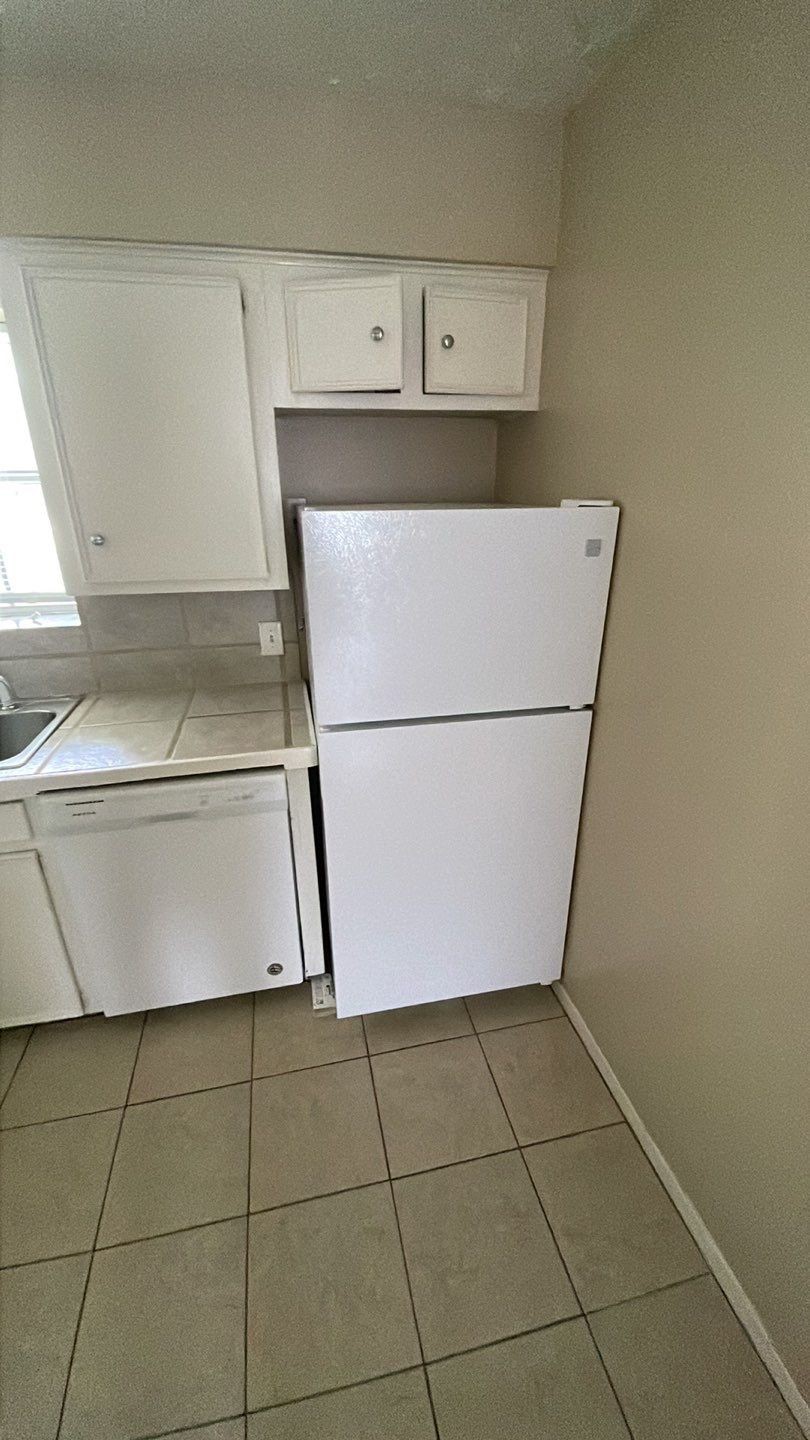 1305 Adams Street, Unit 4 Conroe, TX 77301 - Photo 17 of 32 a view of utility room