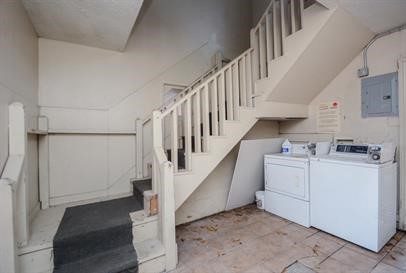 1305 Adams Street, Unit 4 Conroe, TX 77301 - Photo 2 of 32 a view of entryway and hall with wooden floor