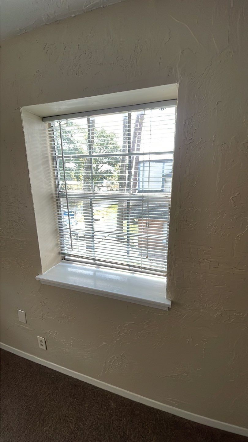 1305 Adams Street, Unit 4 Conroe, TX 77301 - Photo 3 of 32 a view of empty room with window
