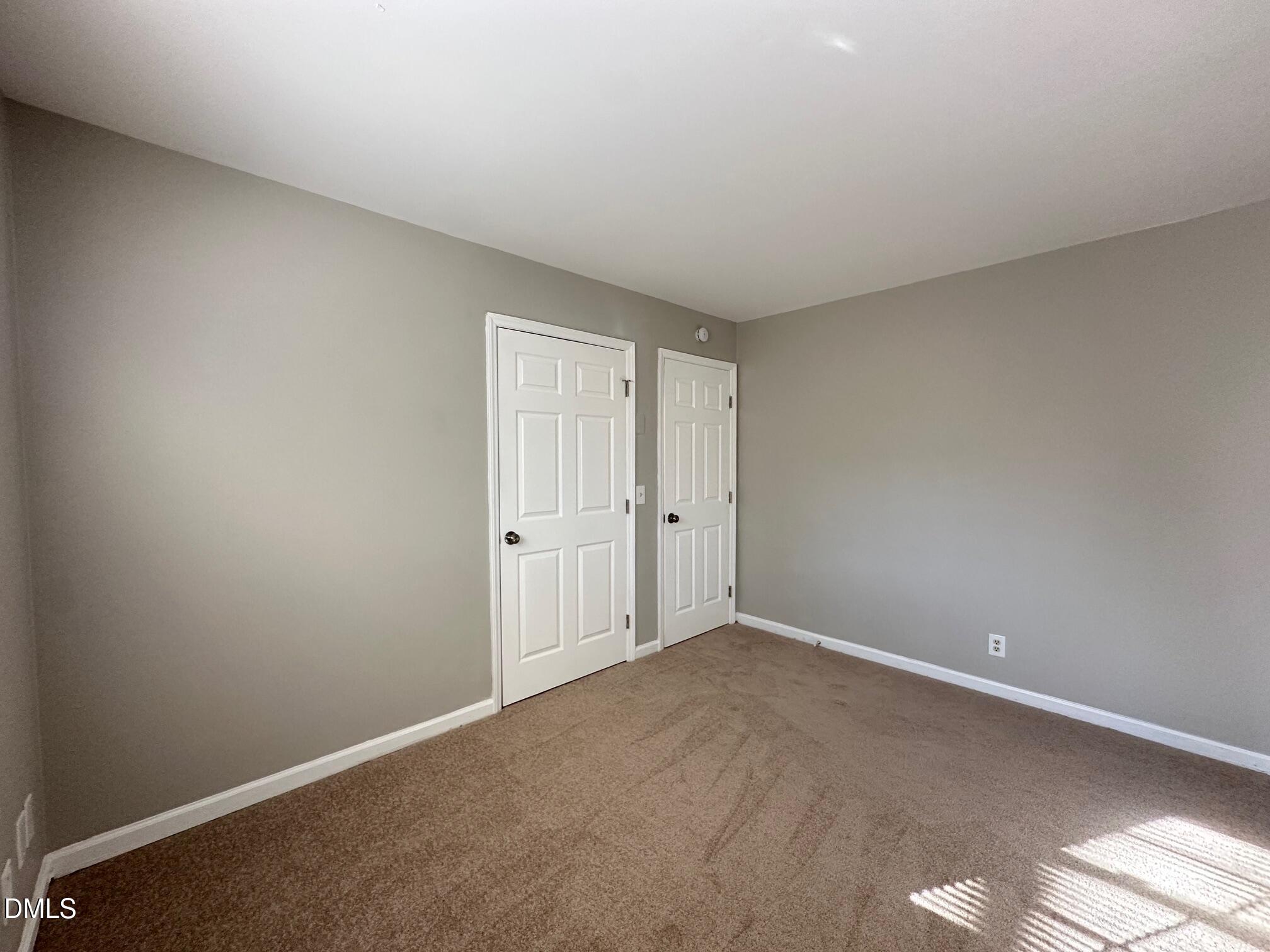 1304 Seabrook Road Raleigh, NC 27610 - Photo 16 of 19 a view of an empty room and window