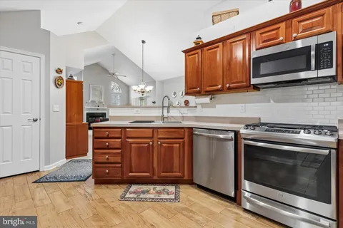 a bedroom with bed and chair