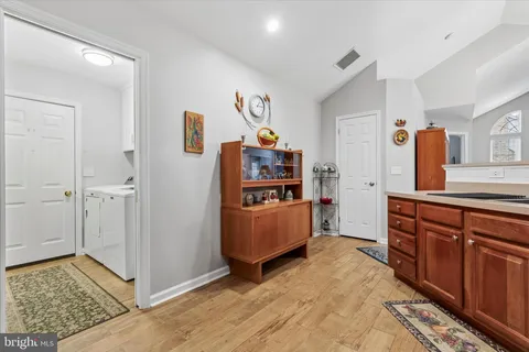 a bed room with a bed and a television