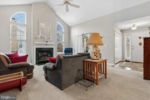 a living room with furniture and a rug