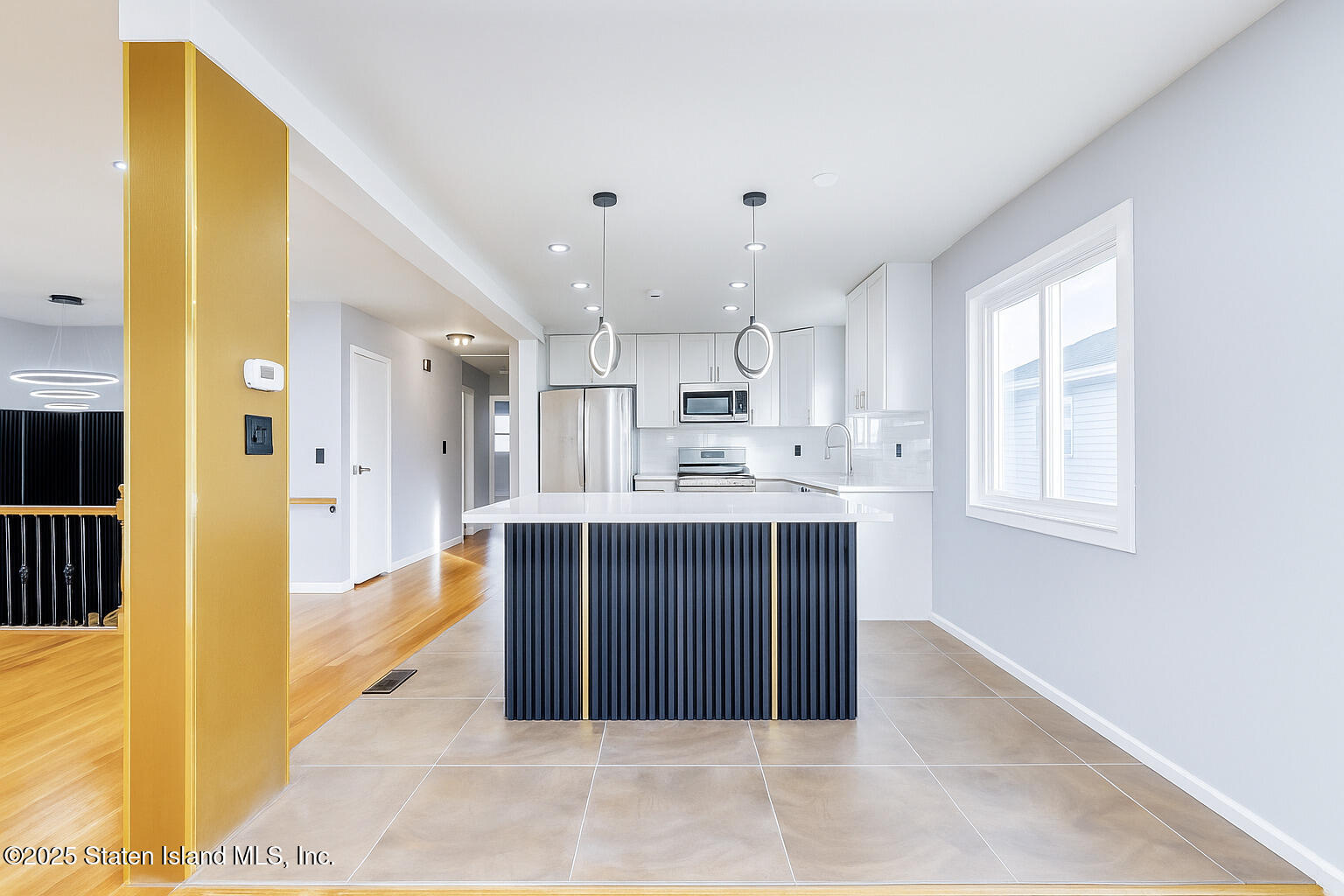 281 Arlene Street Staten Island, NY 10314 - Photo 11 of 42 a view of kitchen with stainless steel appliances kitchen island granite countertop a refrigerator and cabinets