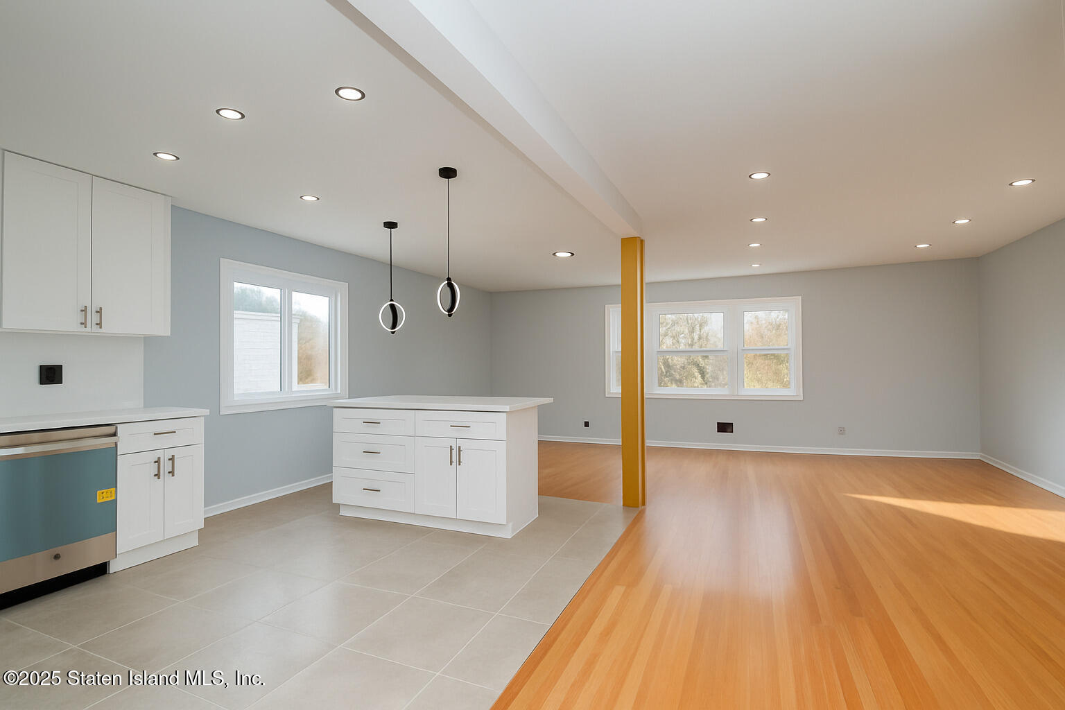 281 Arlene Street Staten Island, NY 10314 - Photo 14 of 42 a large kitchen with a lot of counter space and wooden floor