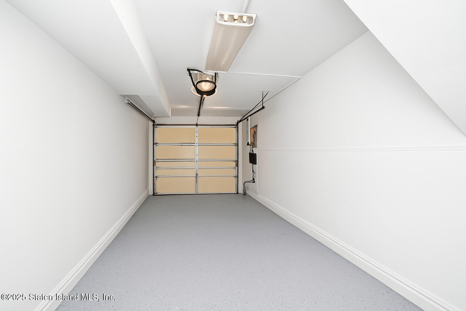 281 Arlene Street Staten Island, NY 10314 - Photo 32 of 42 a view of a room with a ceiling fan