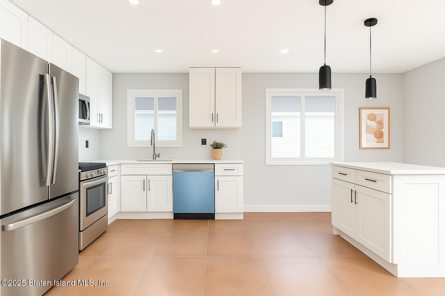 281 Arlene Street Staten Island, NY 10314 - Photo 7 of 42 a kitchen with white cabinets and stainless steel appliances