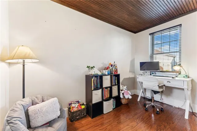 a workspace with furniture and a window