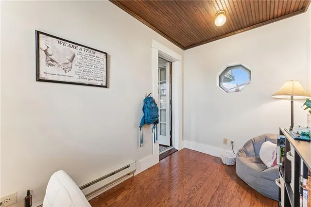 a bedroom with bed and a window