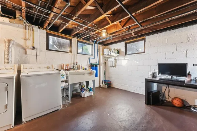 a utility room with dryer and washer