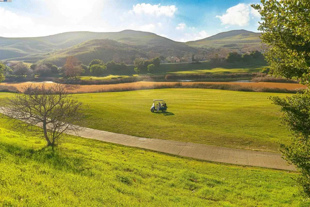 a view of an ocean and a mountain