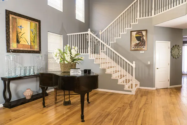 a view of a hallway with seating area