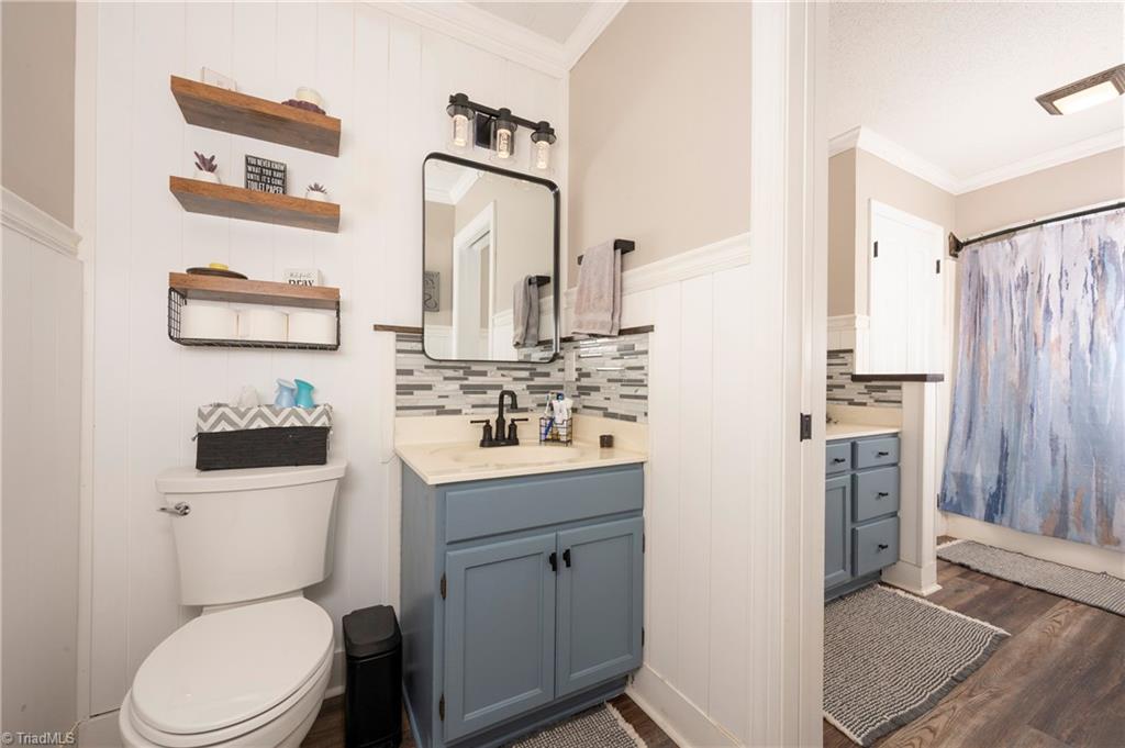 5870 Ferntree Court Pfafftown, NC 27040 - Photo 14 of 28 Half bath is connected to primary bath