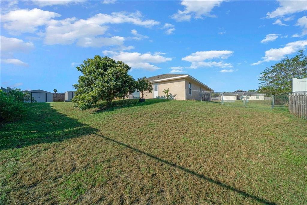 12205 Southeast 100th Court Belleview, FL 34420 - Photo 15 of 73 a view of a house with a yard