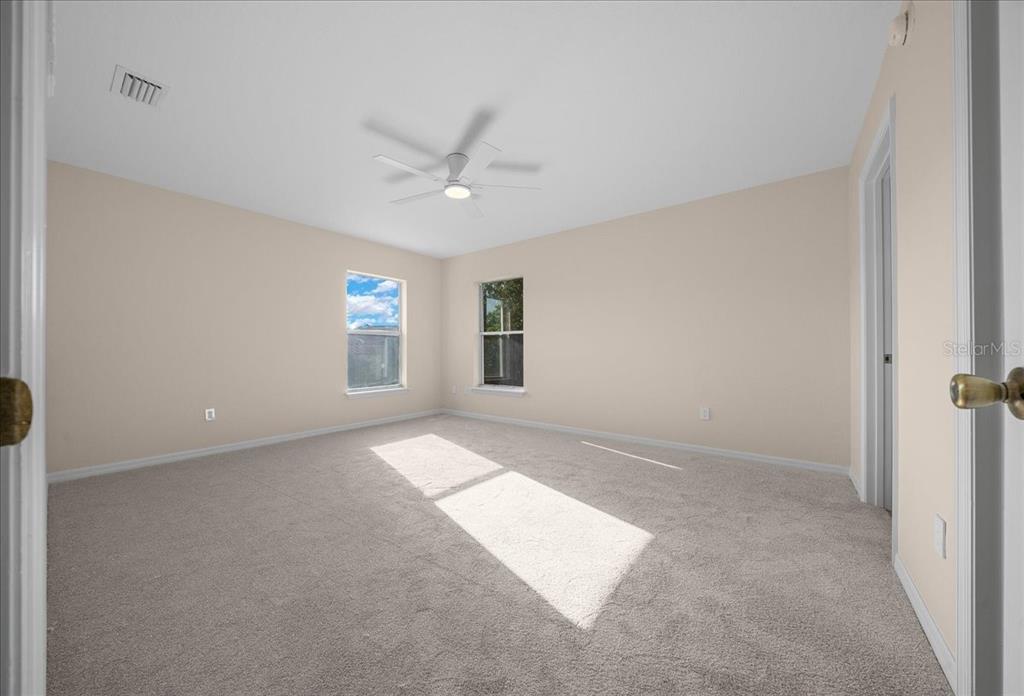 12205 Southeast 100th Court Belleview, FL 34420 - Photo 36 of 73 a view of an empty room with a window