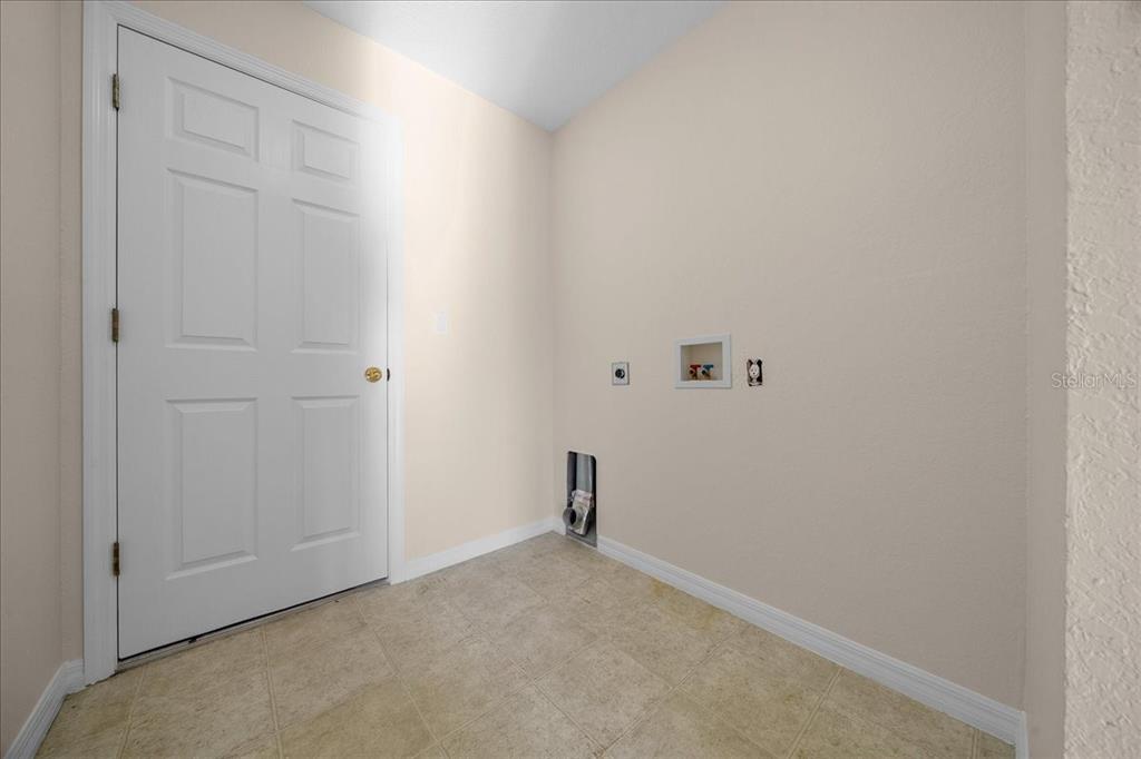 12205 Southeast 100th Court Belleview, FL 34420 - Photo 45 of 73 a view of a room with a sink