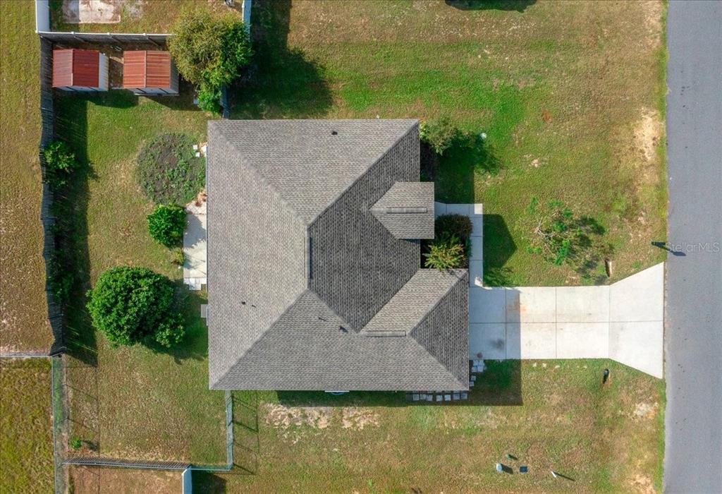 12205 Southeast 100th Court Belleview, FL 34420 - Photo 57 of 73 an aerial view of a house