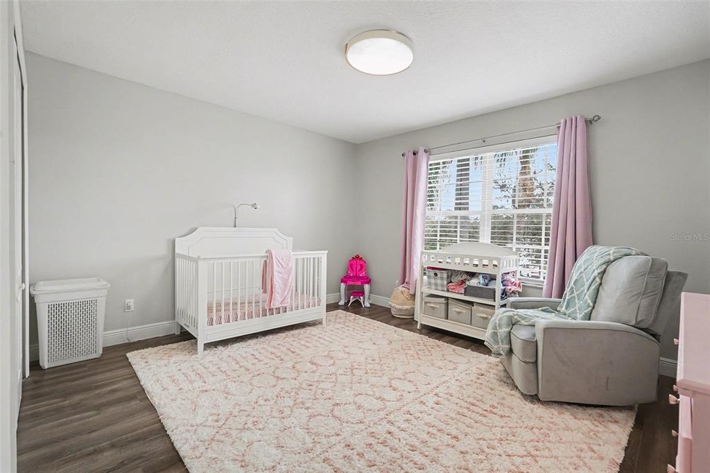 1952 Fruitridge Street Brandon, FL 33510 - Photo 29 of 39 a bedroom with furniture and a window