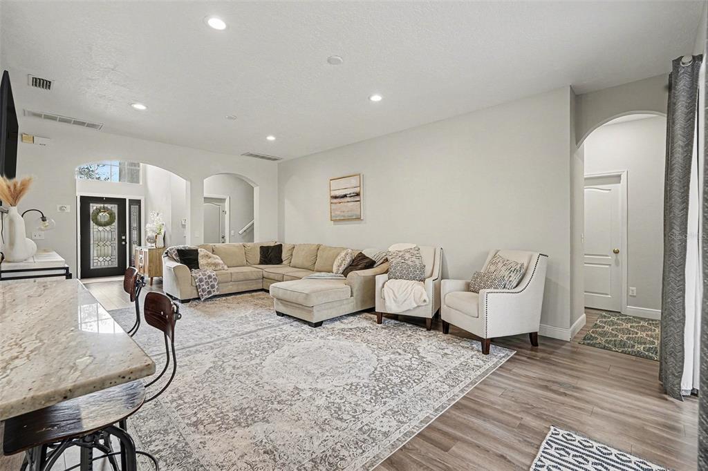 1952 Fruitridge Street Brandon, FL 33510 - Photo 6 of 39 a living room with furniture and a rug