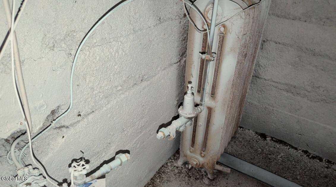 273 Whitney Street Moriah, NY 12974 - Photo 25 of 30 basement pipes....