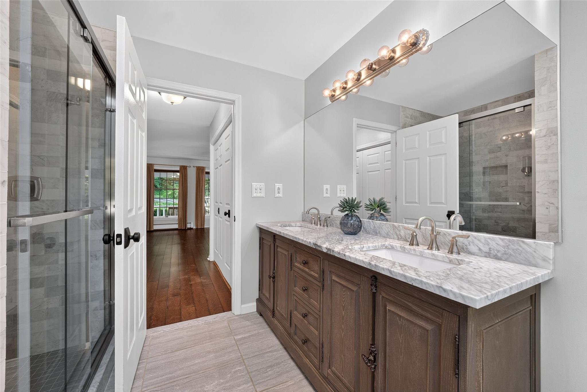172 Shields Road Red Hook, NY 12571 - Photo 19 of 50 a bathroom with a granite countertop sink double and mirror