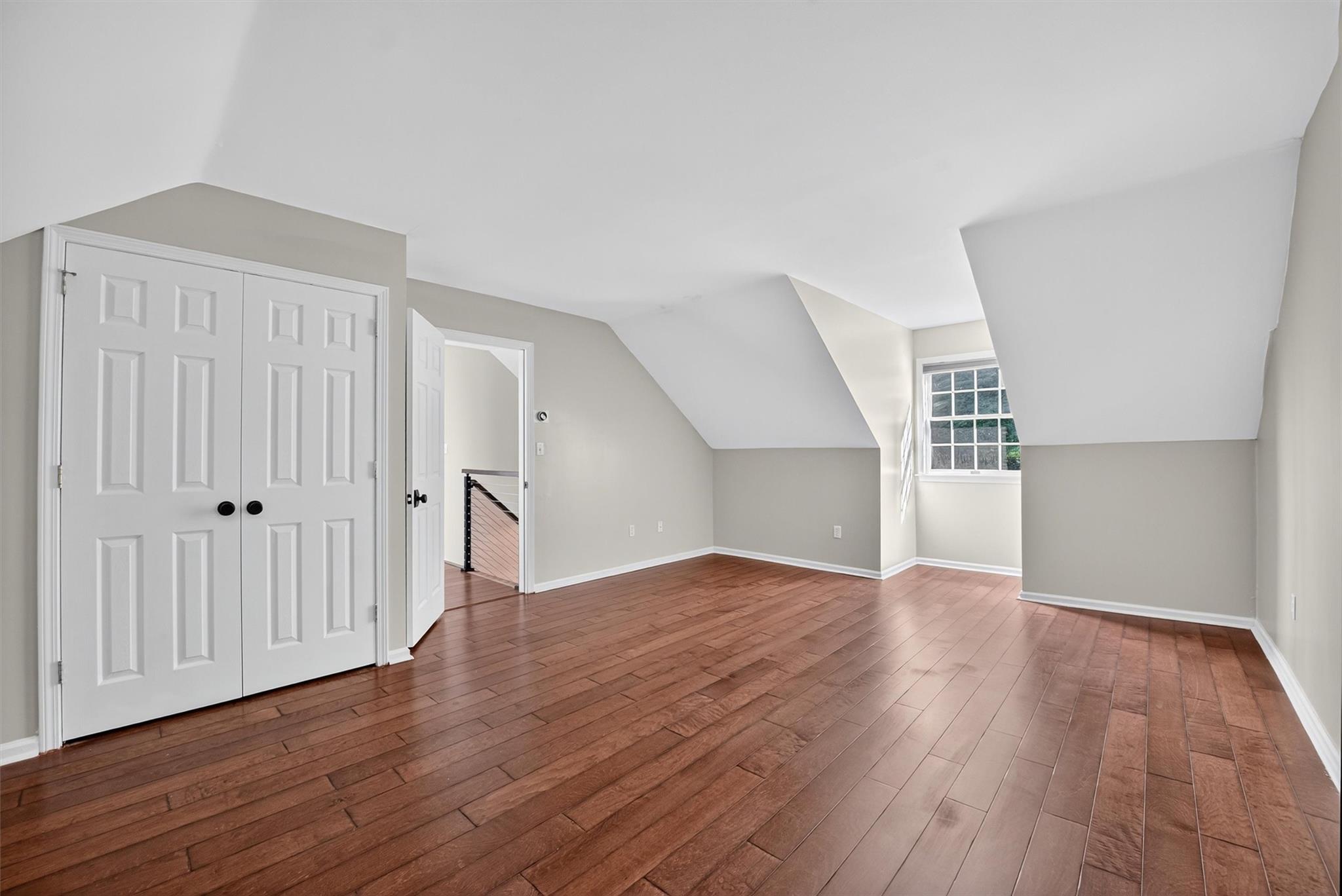 172 Shields Road Red Hook, NY 12571 - Photo 22 of 50 a view of an empty room with wooden floor and a window