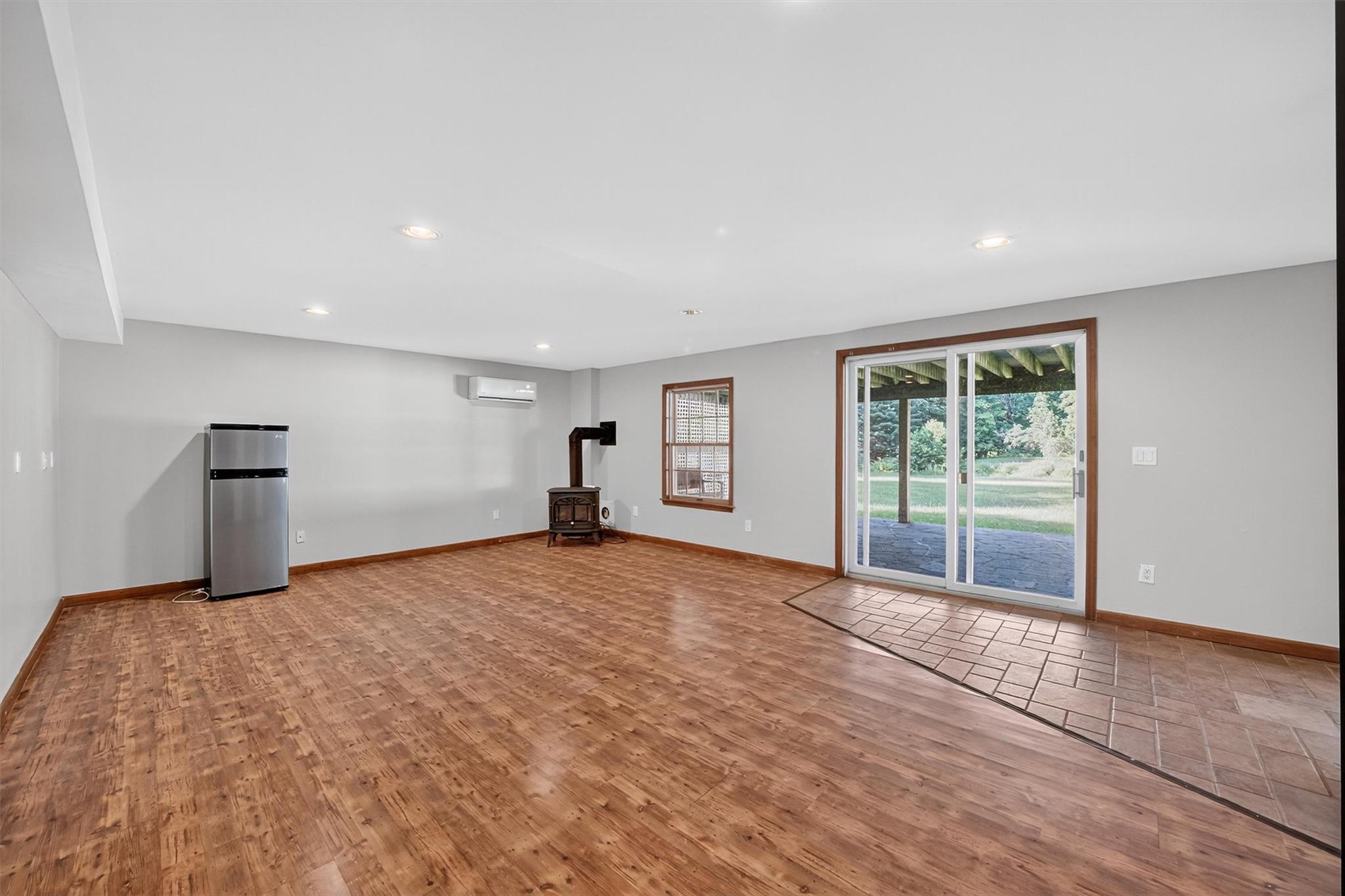172 Shields Road Red Hook, NY 12571 - Photo 27 of 50 a view of an empty room with wooden floor and a window