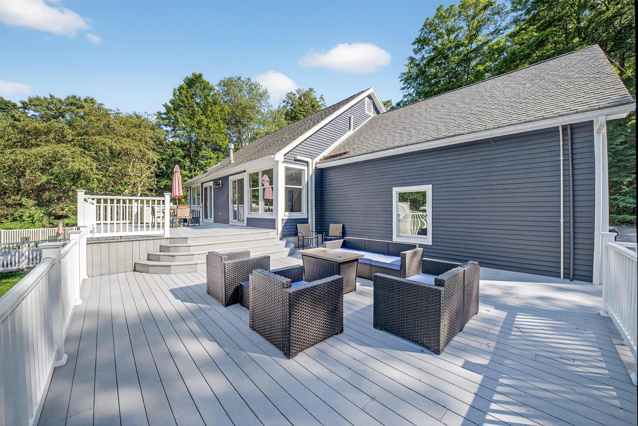 172 Shields Road Red Hook, NY 12571 - Photo 37 of 50 a view of a patio with couches chairs and wooden floor