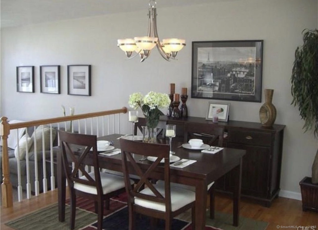 926 Quinnipiac Avenue, Unit 1 New Haven, CT 06513 - Photo 3 of 10 a dining room with furniture and chandelier