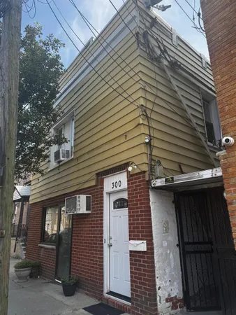 a front view of a house with a garage
