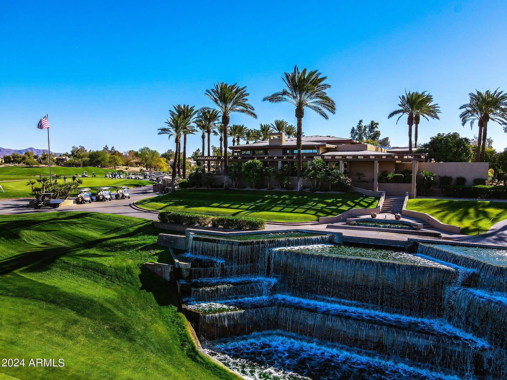 7272 East Gainey Ranch Road, Unit 43 Scottsdale, AZ 85258 - Photo 29 of 40 a view of swimming pool with outdoor seating and yard