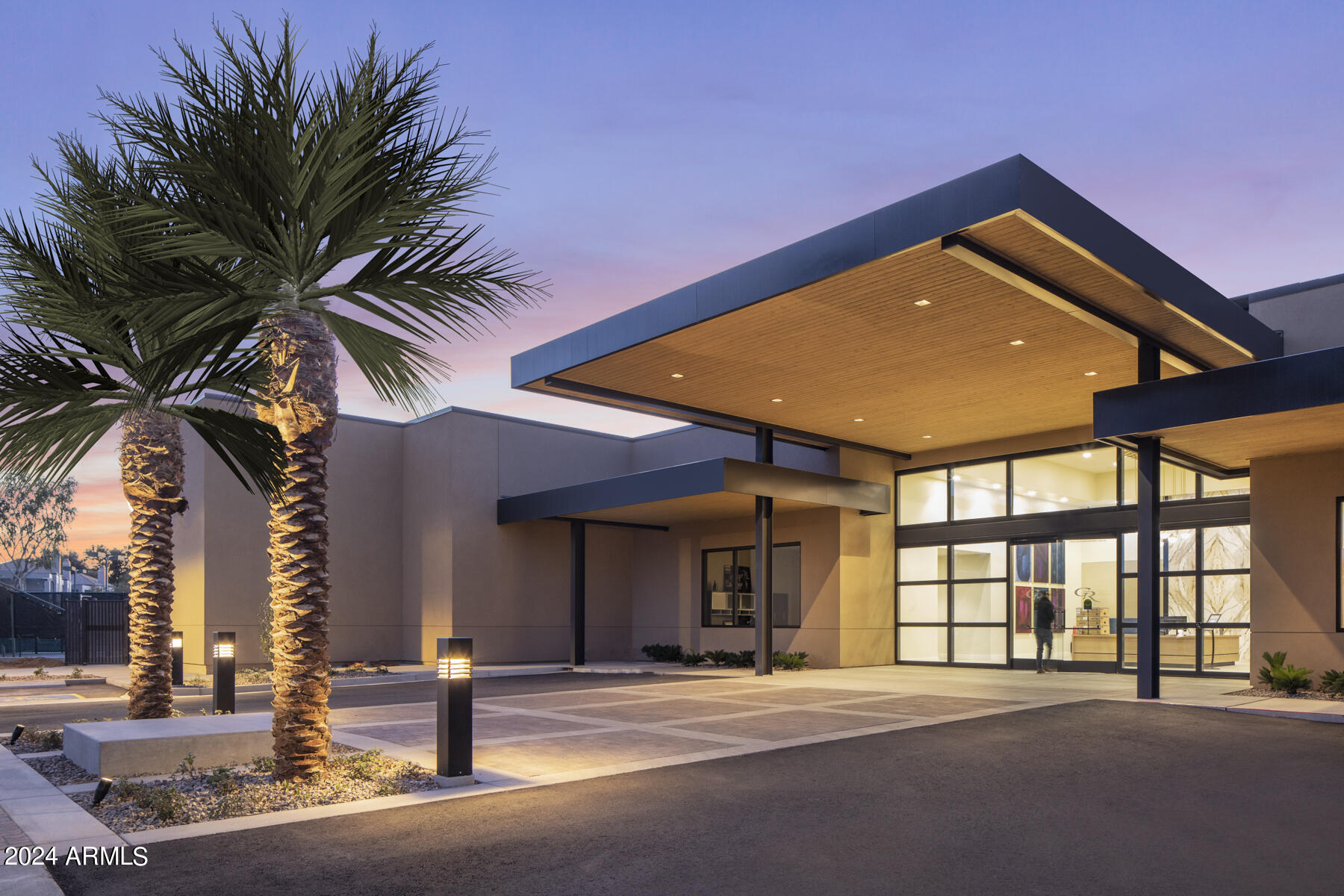 7272 East Gainey Ranch Road, Unit 43 Scottsdale, AZ 85258 - Photo 40 of 40 a front view of a building with palm trees