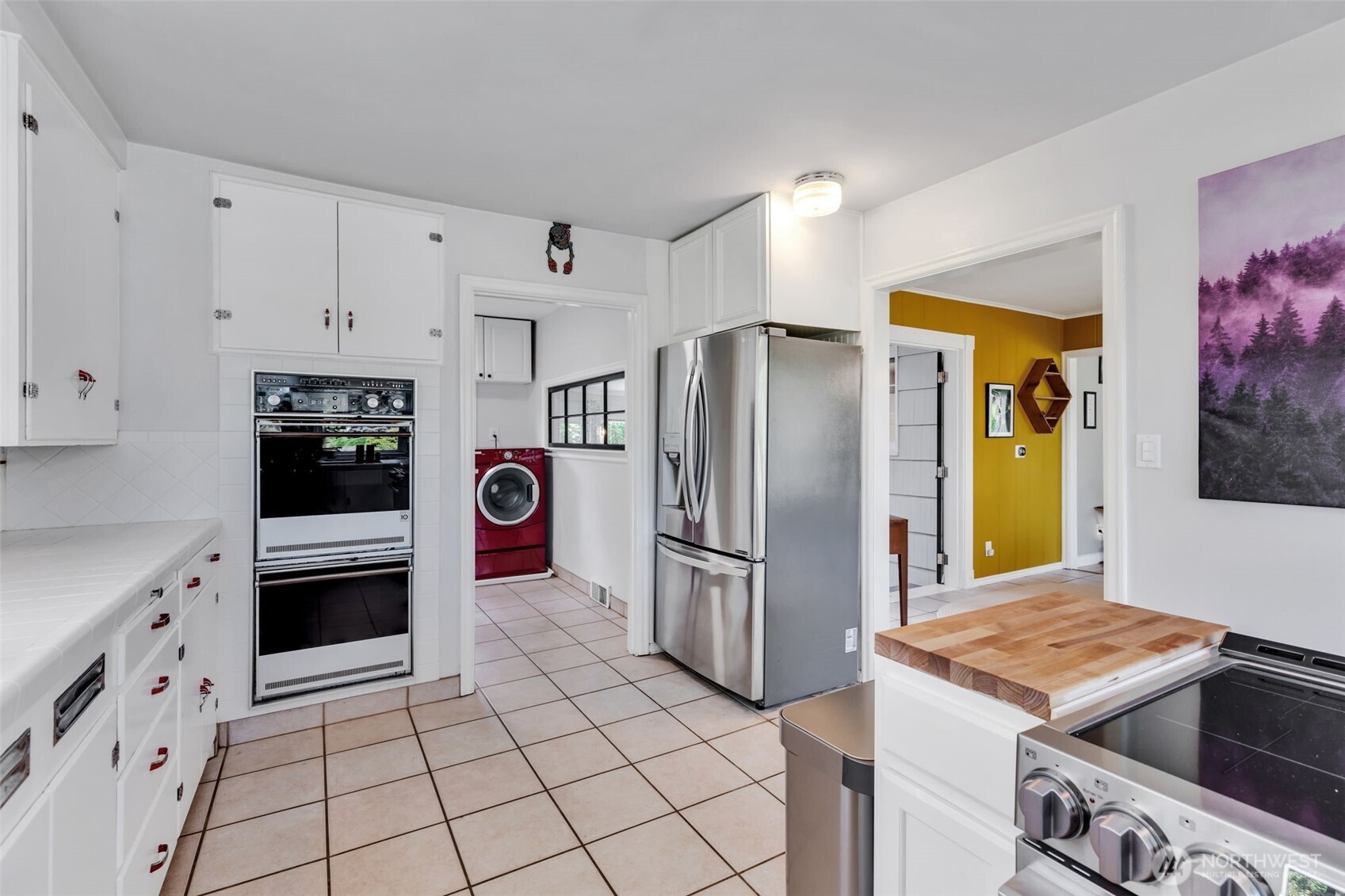 804 Electron Way Fircrest, WA 98466 - Photo 13 of 37 a kitchen with stainless steel appliances granite countertop a refrigerator and a stove