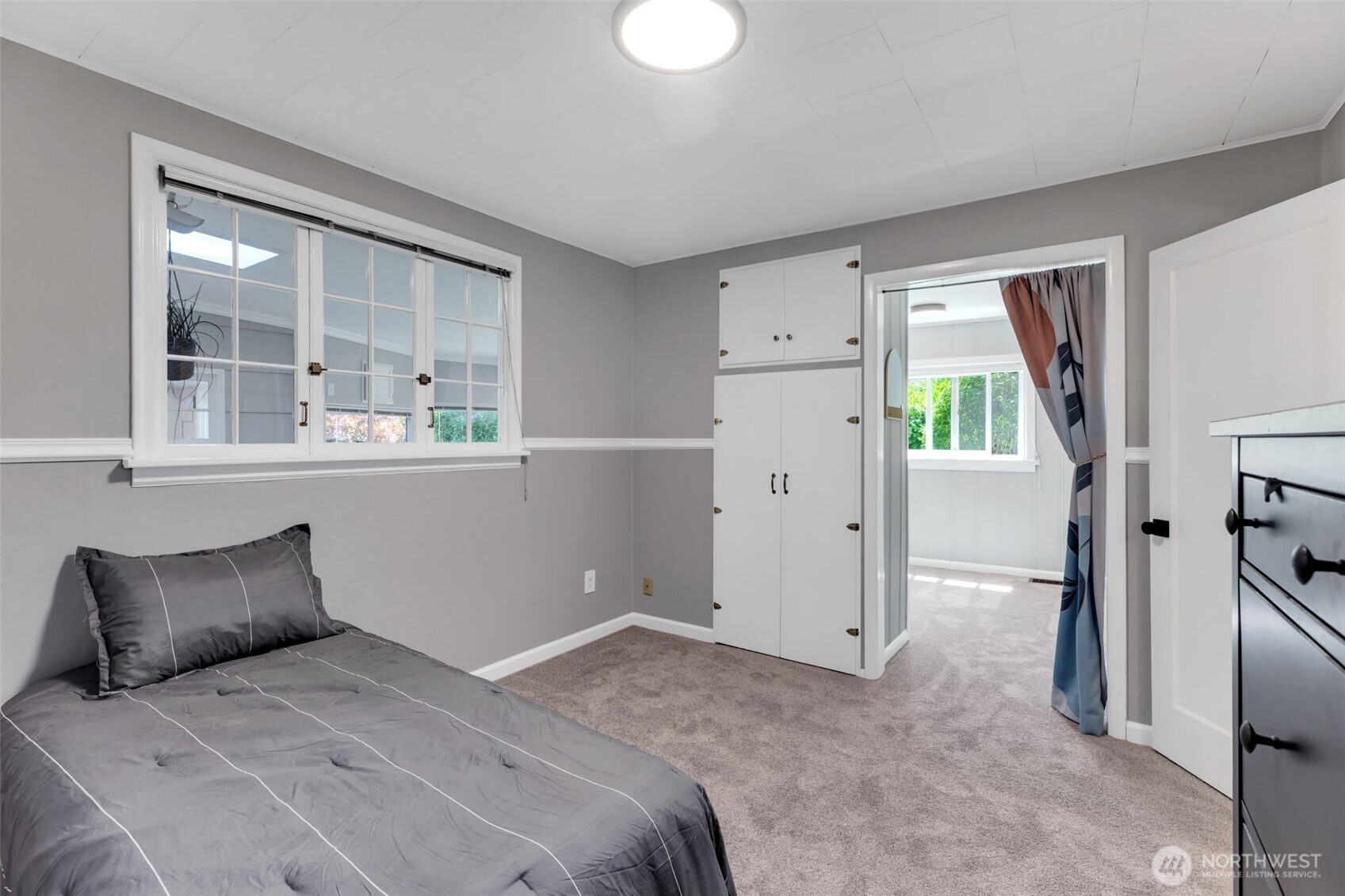 804 Electron Way Fircrest, WA 98466 - Photo 18 of 37 a bedroom with a bed and a window