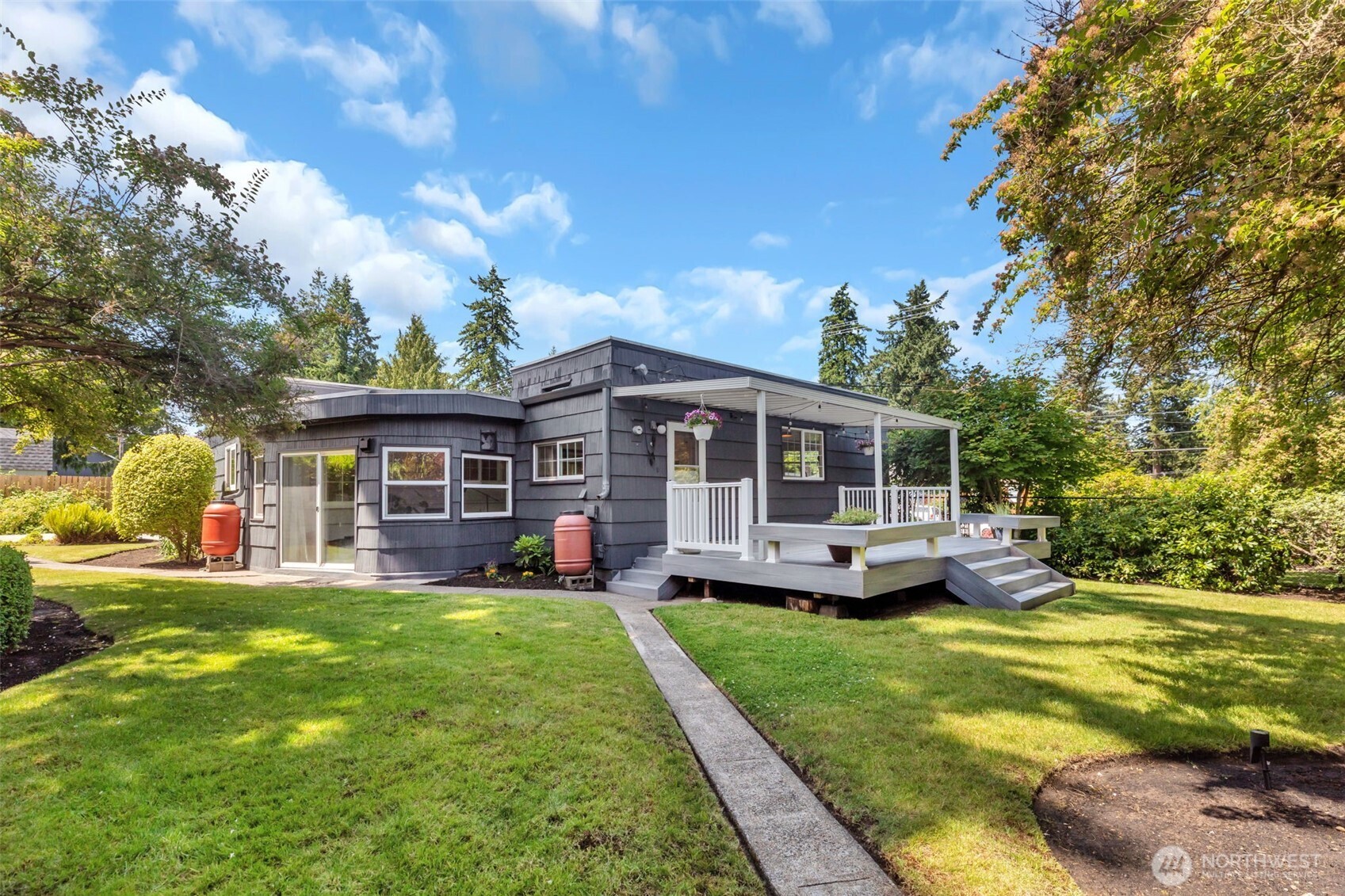 804 Electron Way Fircrest, WA 98466 - Photo 32 of 37 a front view of house with yard barbeque and outdoor seating