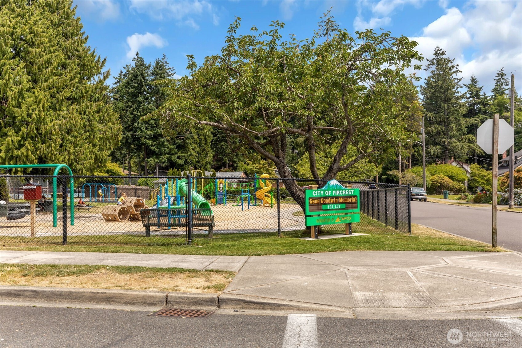 804 Electron Way Fircrest, WA 98466 - Photo 36 of 37 a view of a playground with basketball court