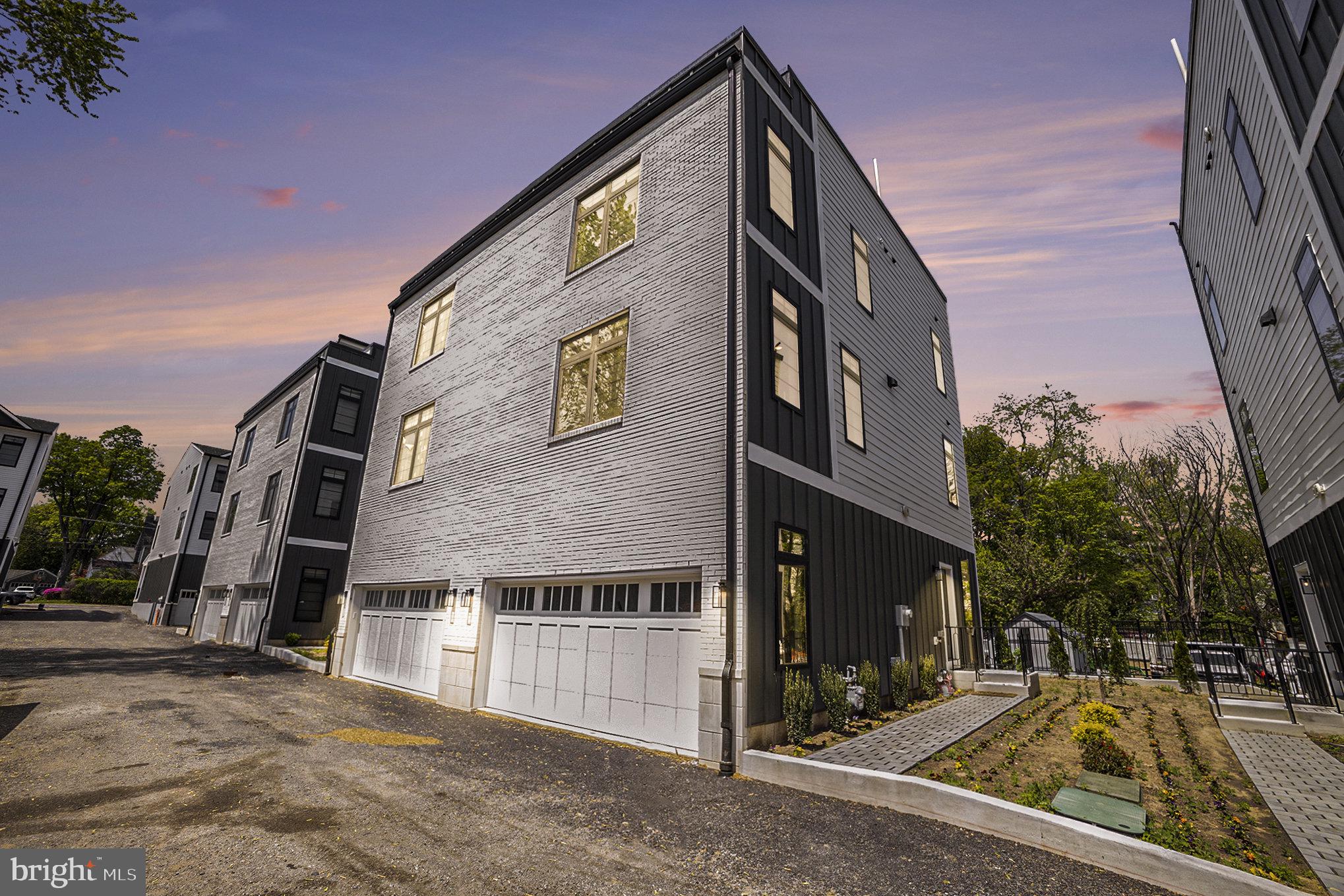 7519 Ridge Avenue, Unit 203 Philadelphia, PA 19128 - Photo 1 of 26 a view of a house with a street