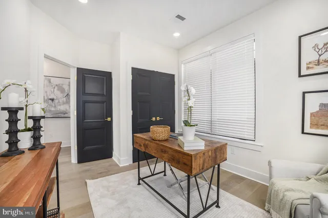 a workspace with furniture and window