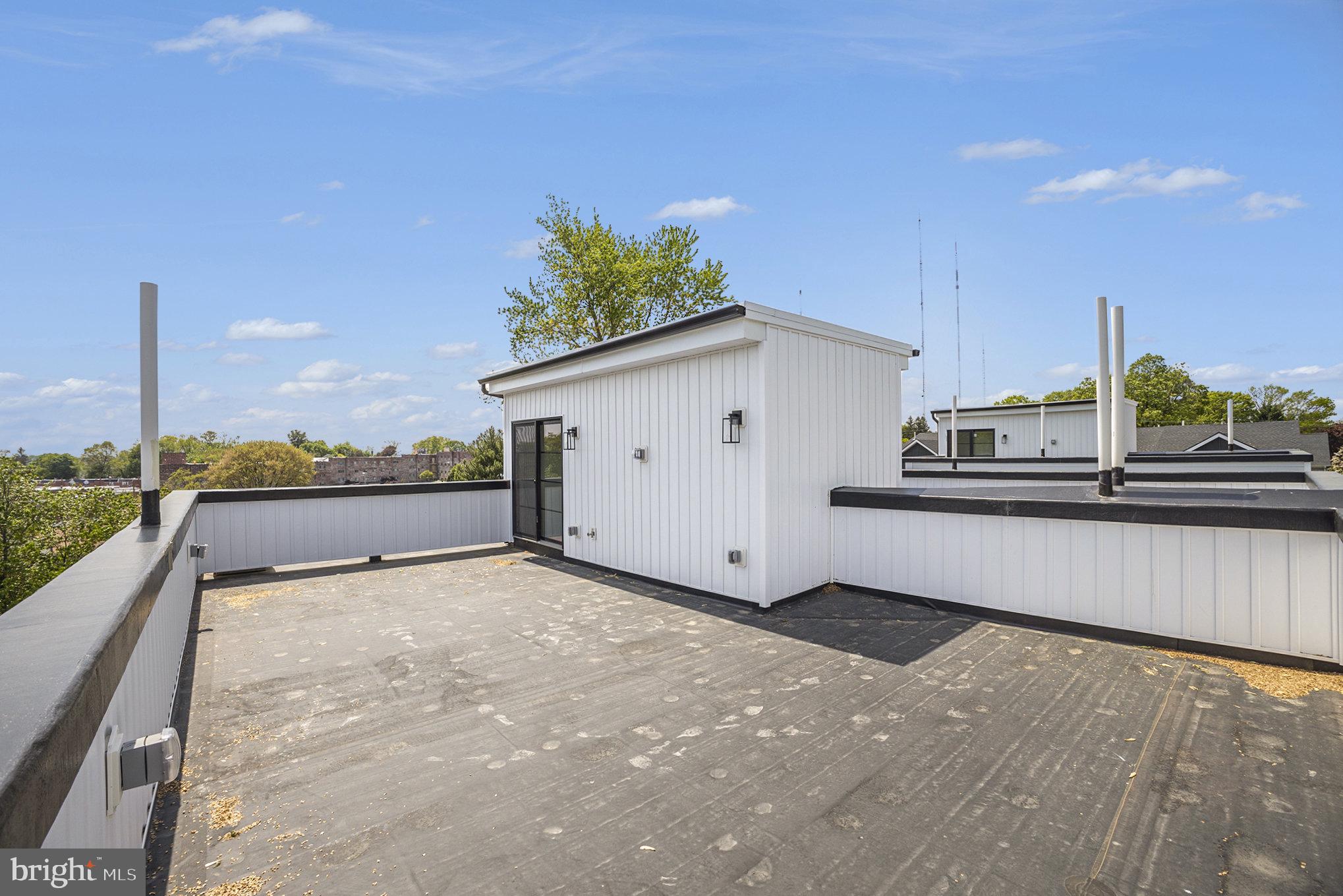 7519 Ridge Avenue, Unit 203 Philadelphia, PA 19128 - Photo 26 of 26 a view of a terrace with skyline